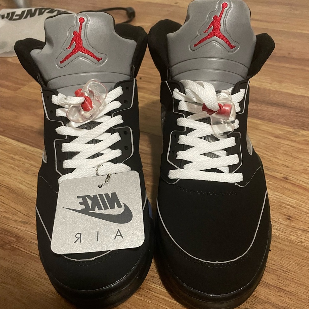 Nike Black and Gray Sneakers with Iconic Design